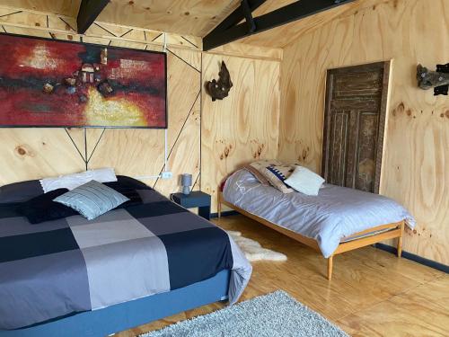 Una cama o camas en una habitación de Hostel Cala 816