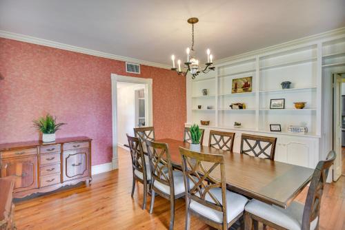 a dining room with a wooden table and chairs at 15 Mi to Gloucester Waterfront Mathews Home! in Onemo