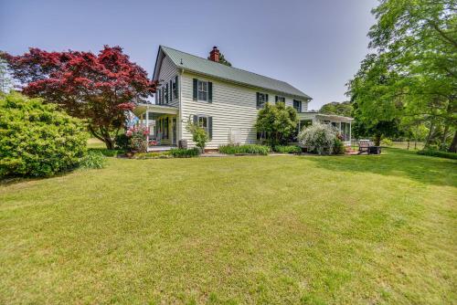 a white house with a large yard at 15 Mi to Gloucester Waterfront Mathews Home! in Onemo