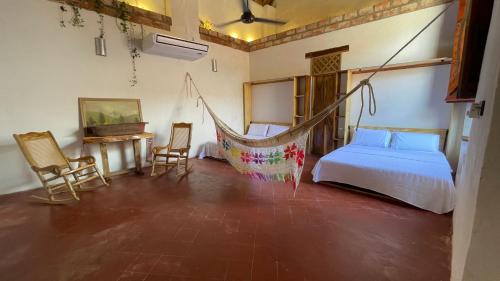 Increible Casa en Mompox con piscinaにあるベッド
