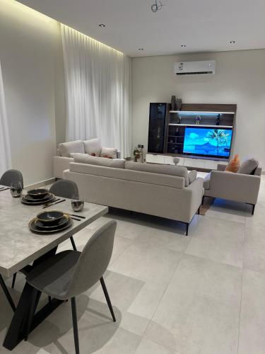 TV a/nebo společenská místnost v ubytování Layan residence