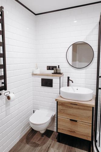 Koupelna v ubytování Apartamenty Chrobrego 10