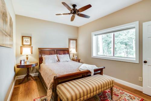 a bedroom with a bed and a ceiling fan at Charming Starkville Vacation Rental about 5 Mi to MSU! in Starkville