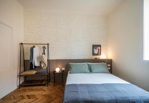 Postel nebo postele na pokoji v ubytování LUZ 02 Studio