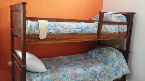 a couple of bunk beds in a room at Chalet Paloma 3 in La Falda