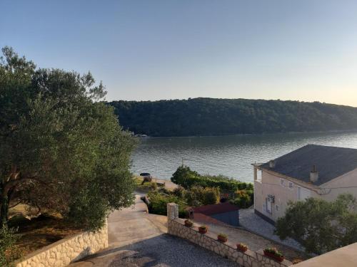 Apartments by the sea Kampor, Rab - 5051