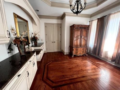 a large bathroom with a sink and a mirror at The Bayberry Retreat in Gainesville