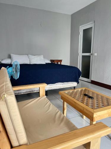 Postel nebo postele na pokoji v ubytování Habitacion privada Lamat I