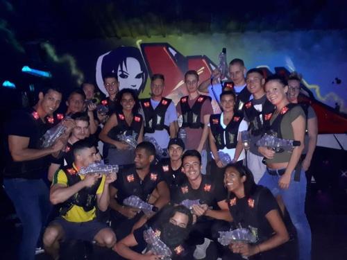 a group of people posing for a picture with their awards at Maze Backpackers - Sydney in Sydney