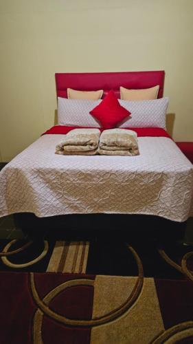 Happy stay guest house in klerksdorp North Westにあるベッド