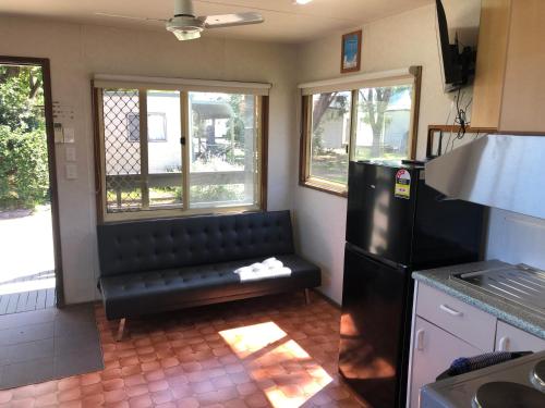 Η κουζίνα ή μικρή κουζίνα στο Coachstop Caravan Park