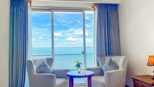 Zona de estar de Rozy Apartment in City Center with Sea View