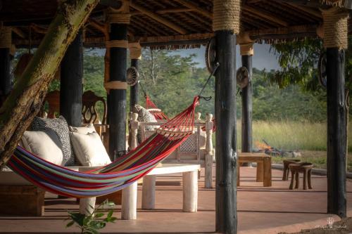 a hammock hanging from a gazebo at Mara Major Camp in Masai Mara