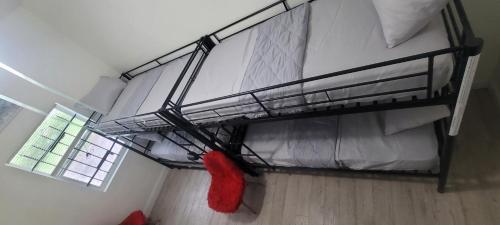 a bedroom with a bunk bed in a room at Large, Central, Lovely & Cozy 4bed/2bath - House by Everbank Stadium JACKSONVILLE in Jacksonville
