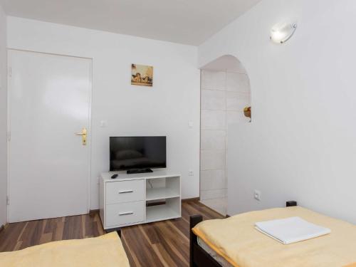 Apartments Djurkovic - Two-Bedroom Apartment with Shared Terrace and Sea View
