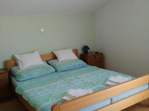 Postel nebo postele na pokoji v ubytování Apartments Vala - Superior Studio Apartment A6