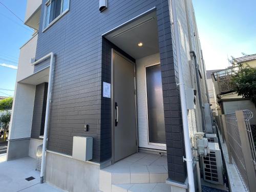 a door on the side of a building at Starry Ocean in Tokyo