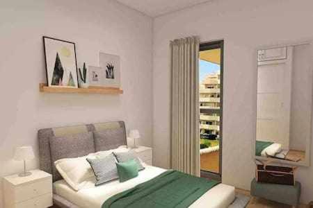 Postel nebo postele na pokoji v ubytování Stefys beach apartment