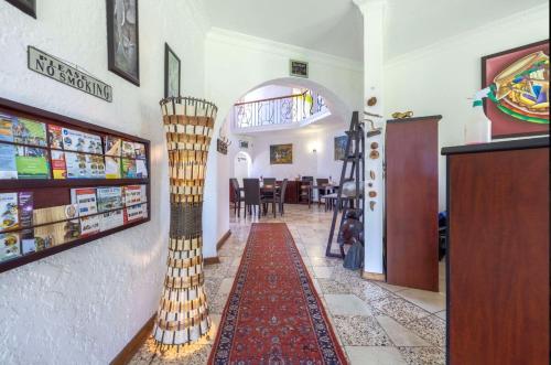 a room with a store with a rug on the floor at 122 on Krantzview previously BizAfrika Guest Lodge in Kloof
