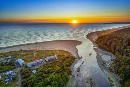an aerial view of the beach at sunset at Hi-Tide Resort in Moclips