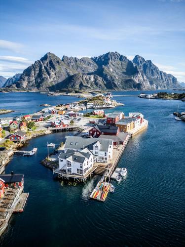an aerial view of a harbor with boats in the water at Villa Bryggekanten - by Classic Norway Hotels in Henningsvær