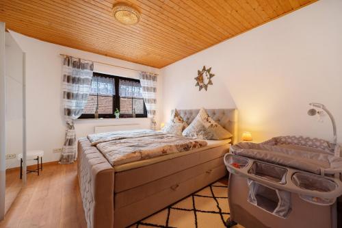 Ένα ή περισσότερα κρεβάτια σε δωμάτιο στο Betty’s Home