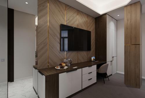 Телевизор и/или развлекательный центр в Energy hotel Tashkent
