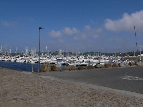 a bunch of boats parked in a marina at Ti Nolgann in Lannilis