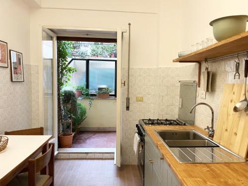 Kuchyň nebo kuchyňský kout v ubytování Apartment Casa Iole