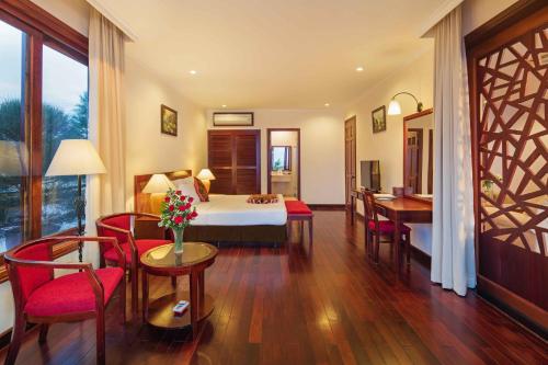 Postel nebo postele na pokoji v ubytování Sunny Beach Resort & Spa Mui Ne