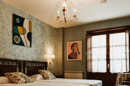Postel nebo postele na pokoji v ubytování Casa da Capilla