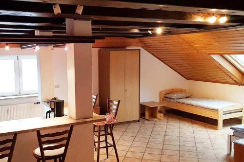 Ένα ή περισσότερα κρεβάτια σε δωμάτιο στο Penthouse Apartment near Nürnberg