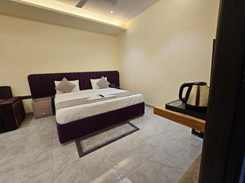 Ένα ή περισσότερα κρεβάτια σε δωμάτιο στο Hotel the Glass House