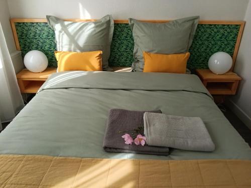Katil atau katil-katil dalam bilik di Appartement au cœur de la Petite Cité de Caractère