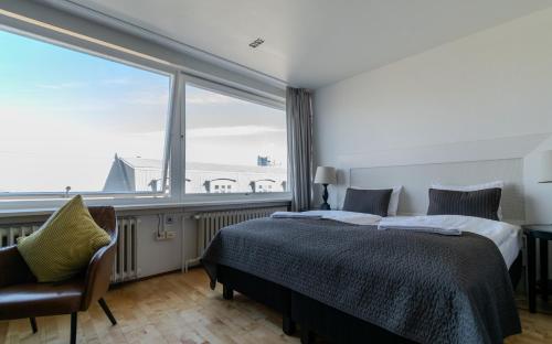 Postel nebo postele na pokoji v ubytování Máni Apartments