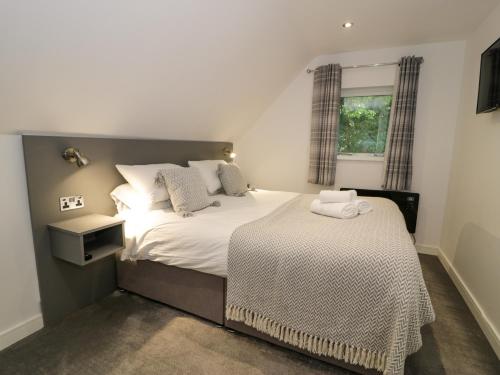 Voodi või voodid majutusasutuse Classic Lodge 30 toas