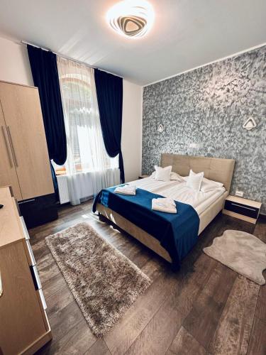 Postel nebo postele na pokoji v ubytování Casa Mugur