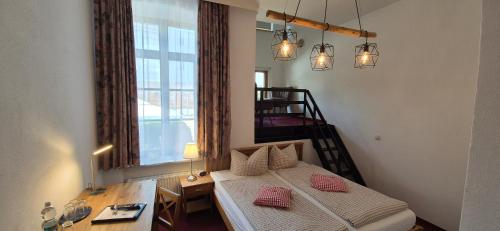 Postel nebo postele na pokoji v ubytování Hotel Meridian
