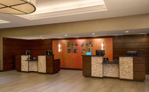 a lobby with a waiting area in a hotel at DoubleTree by Hilton Minneapolis Airport, MN in Bloomington