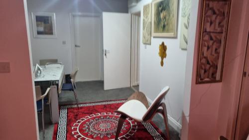 a room with a desk and a chair in a room at Apartment 3 in Leicester