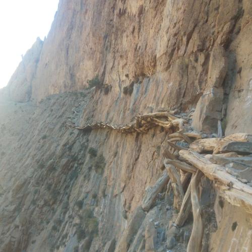 a steep mountain side with a cliff at Taghia Accommodation in Taghia