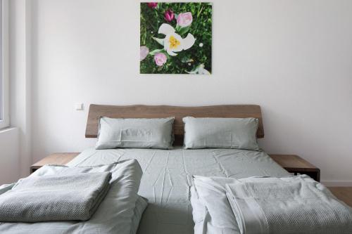Postel nebo postele na pokoji v ubytování Mcello Apartments