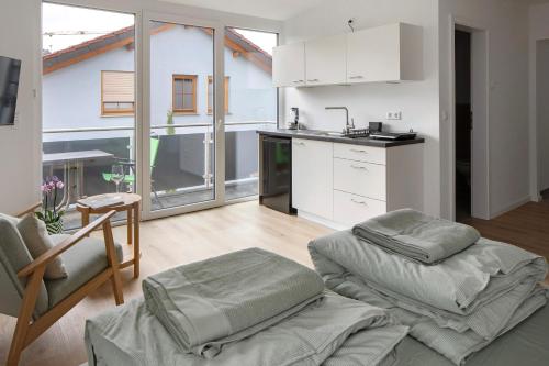 Kuchyň nebo kuchyňský kout v ubytování Mcello Apartments