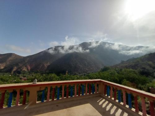 a balcony with a view of a mountain at Gite Gougadir Imoughlad in Imlil