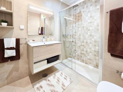 Koupelna v ubytování Apartment Praia Rocha Vista Mar Sand