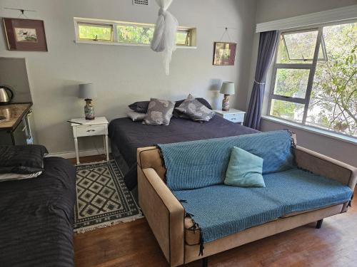 Zona de estar de Bloom Guest House