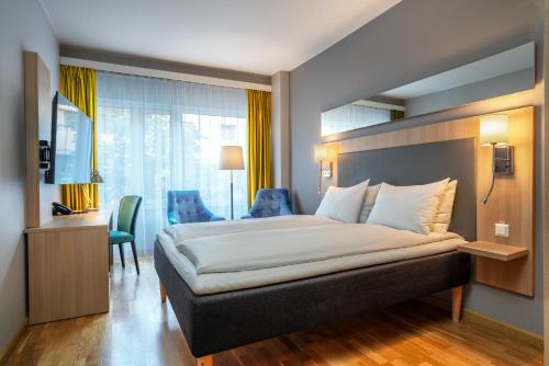 Katil atau katil-katil dalam bilik di Thon Hotel Lillestrøm