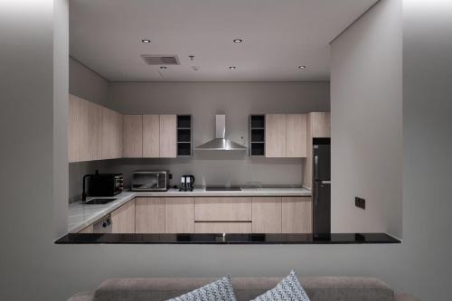 Кухня или мини-кухня в أجنحة لفيف السلام - Lafif Apartments-Al-Salam
