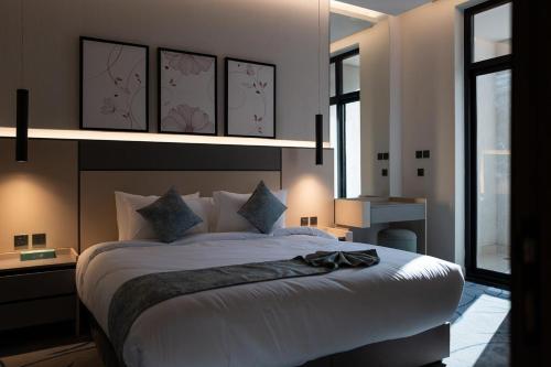 Кровать или кровати в номере أجنحة لفيف السلام - Lafif Apartments-Al-Salam