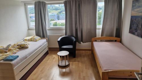Postel nebo postele na pokoji v ubytování Rooms & Apartments Schwäbisch Gmünd